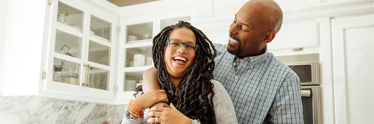 Man hugging a woman