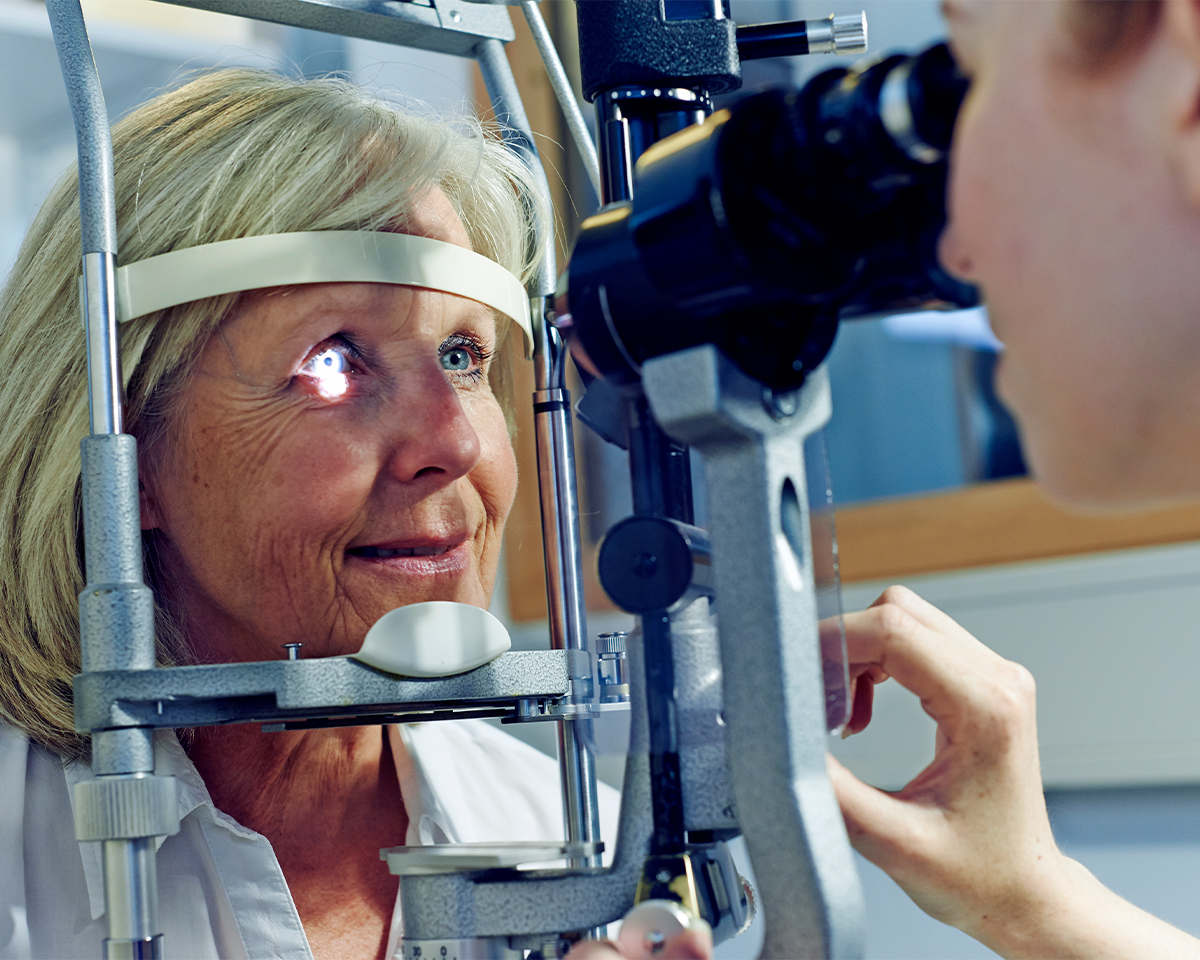 Woman getting her eyes checked by an ophthalmologist