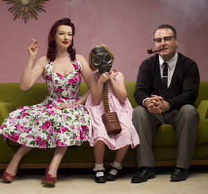 man and woman smoking with child inbetween them-v2