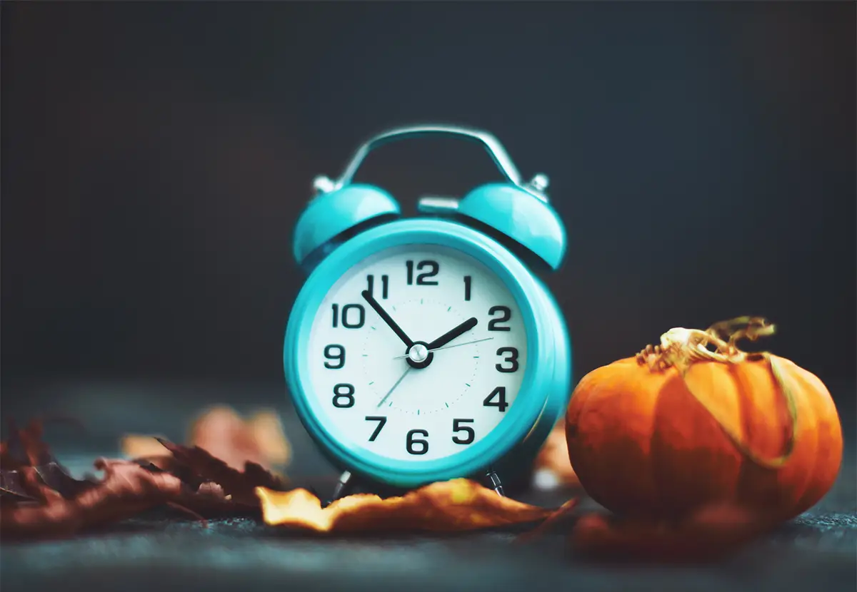 Alarm Clock with Fall Decorations for Daylight Savings Time