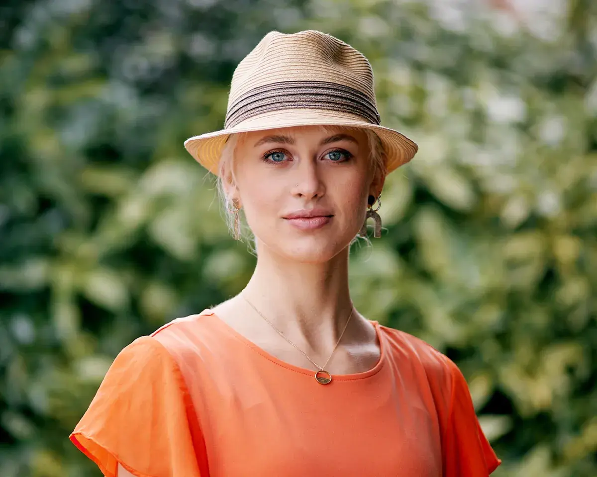 Woman looking confident in a hat